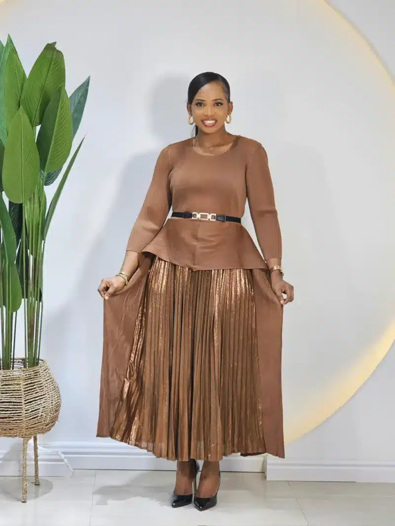 PLEATED MIYAKI PEPLUM DRESS