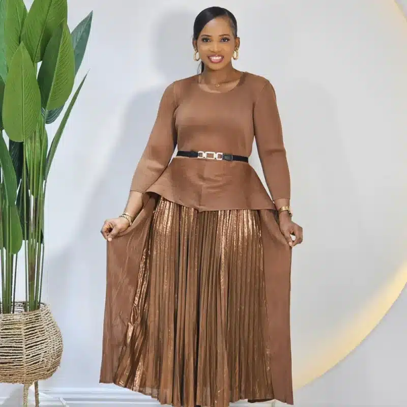 PLEATED MIYAKI PEPLUM DRESS