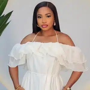 OFF SHOULDER CAPE HEM DRESS - Image 3